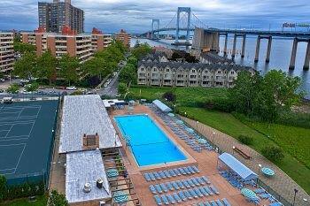 view of swimming pool featuring a water view