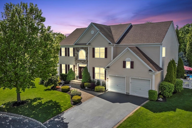 7 Moreland Ct, Mount Sinai, NY 11766 - colonial home with driveway, a garage, and roof with shingles