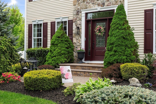 7 Moreland Ct, Mount Sinai, NY 11766 - property entrance featuring stone siding
