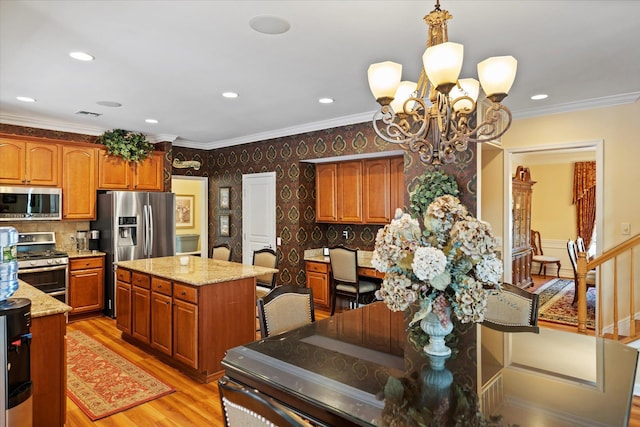 7 Moreland Ct, Mount Sinai, NY 11766 - kitchen featuring appliances with stainless steel finishes, wallpapered walls, a chandelier, light wood-style floors, and brown cabinetry