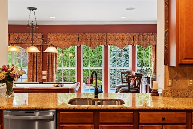 7 Moreland Ct, Mount Sinai, NY 11766 - kitchen with stainless steel dishwasher, a sink, crown molding, light stone countertops, and plenty of natural light