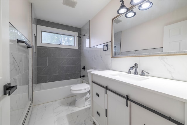 full bath featuring a baseboard radiator, toilet,  shower combination, marble finish floor, and vanity