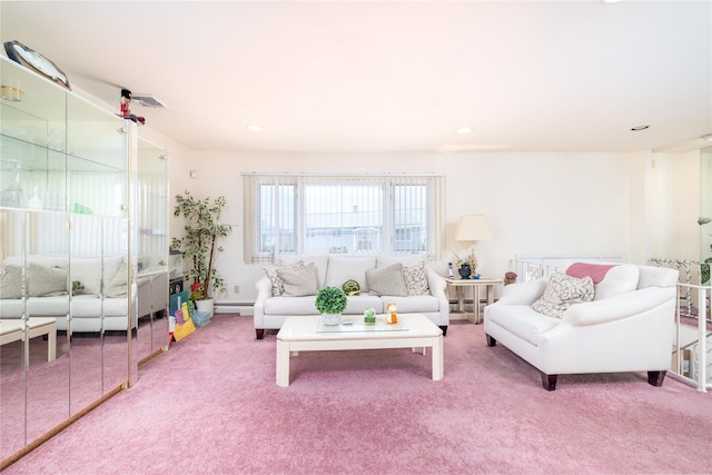 585 Nassau Ave, Freeport, NY 11520 - carpeted living room with a baseboard heating unit