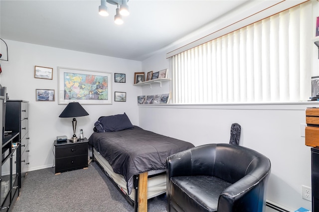 585 Nassau Ave, Freeport, NY 11520 - bedroom featuring carpet, a baseboard radiator, and baseboards