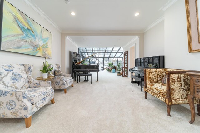 sitting room featuring light colored carpet, ornamental molding, and recessed lighting