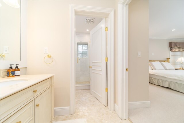full bath featuring baseboards, connected bathroom, vanity, a shower stall, and recessed lighting