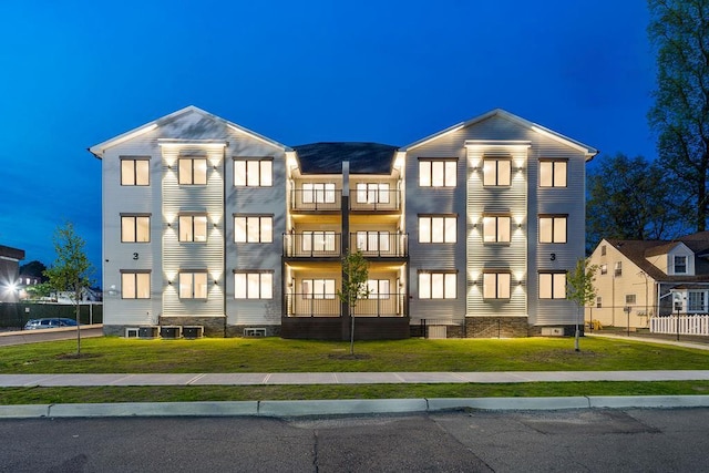 view of property at twilight