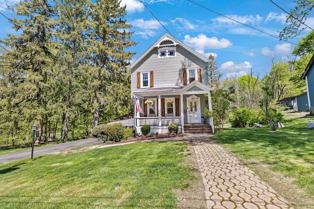 80 Hill St, Walden, NY 12586 - victorian house featuring covered porch and a front lawn