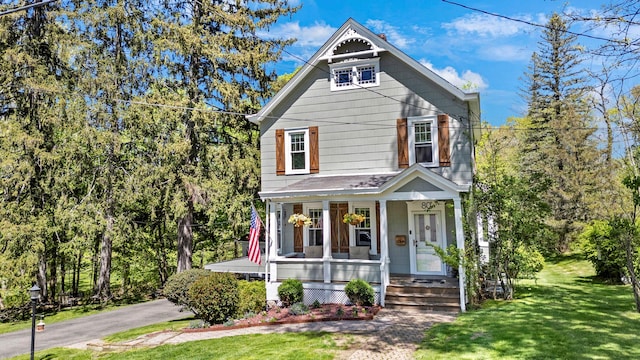 80 Hill St, Walden, NY 12586 - victorian house featuring a front yard and a porch