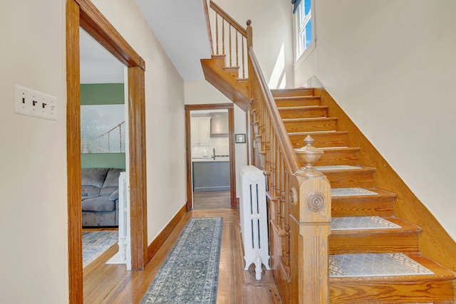 80 Hill St, Walden, NY 12586 - stairway featuring wood finished floors and baseboards