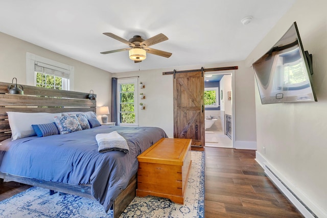 80 Hill St, Walden, NY 12586 - bedroom with wood finished floors, a barn door, baseboard heating, and multiple windows