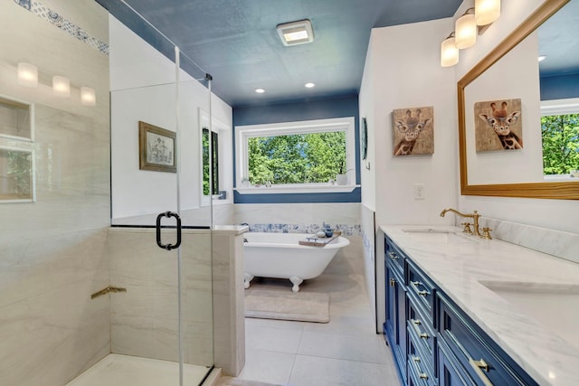 80 Hill St, Walden, NY 12586 - bathroom with a sink, tile patterned floors, a stall shower, double vanity, and a freestanding tub