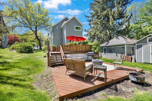 80 Hill St, Walden, NY 12586 - deck with a yard, a fire pit, and an outbuilding
