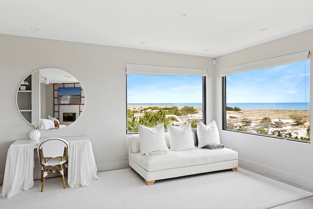 199 Dune Rd, Westhampton Beach, NY 11978 - living area with a water view and baseboards