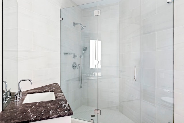 199 Dune Rd, Westhampton Beach, NY 11978 - bathroom featuring a stall shower and vanity