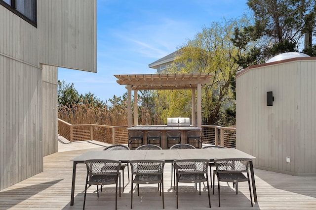 199 Dune Rd, Westhampton Beach, NY 11978 - wooden terrace featuring outdoor dining space and a pergola
