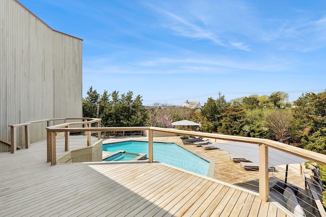 199 Dune Rd, Westhampton Beach, NY 11978 - view of swimming pool with a deck and a pool with connected hot tub