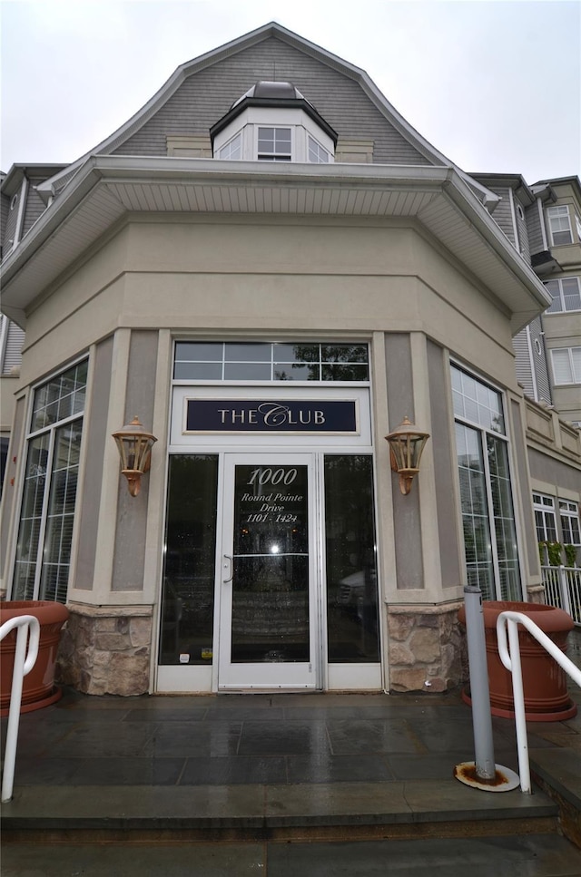 1308 Round Pointe Dr Unit 1308, Haverstraw, NY 10927 - view of exterior entry with stone siding