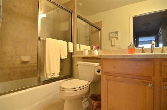 1308 Round Pointe Dr Unit 1308, Haverstraw, NY 10927 - bathroom featuring tile patterned flooring, enclosed tub / shower combo, toilet, and vanity