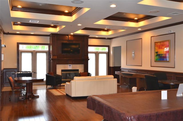 1308 Round Pointe Dr Unit 1308, Haverstraw, NY 10927 - rec room featuring crown molding, a large fireplace, plenty of natural light, wainscoting, and dark wood finished floors