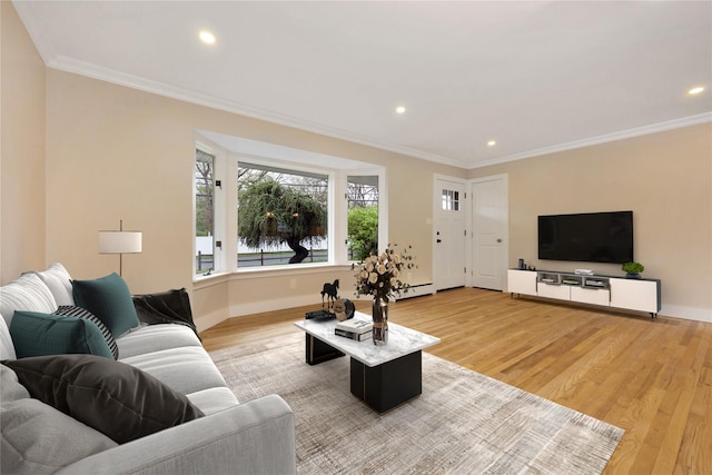 living area with ornamental molding, a baseboard radiator, light wood-type flooring, recessed lighting, and baseboards