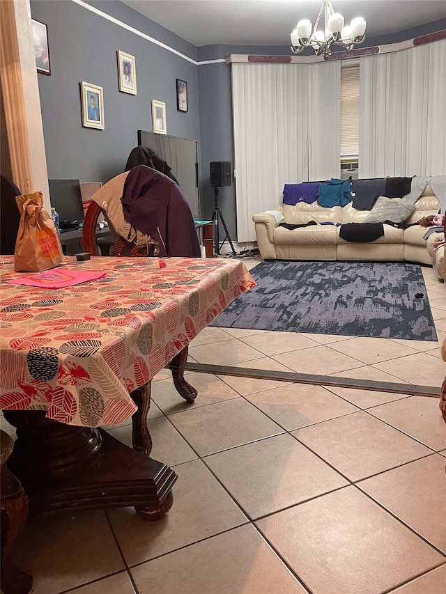 133 Highland Pl, Brooklyn, NY 11208 - rec room with tile patterned floors and a chandelier