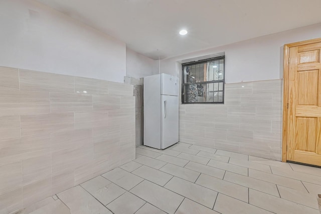 372 Grand Ave, Brooklyn, NY 11238 - unfurnished room with tile walls, light tile patterned floors, wainscoting, and recessed lighting