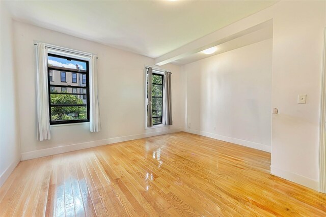 372 Grand Ave, Brooklyn, NY 11238 - unfurnished room featuring light wood-style floors and baseboards