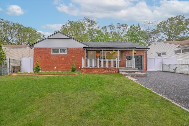717 Janos Ln, West Hempstead, NY 11552 - ranch-style home with brick siding and a porch