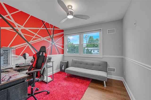 office with ceiling fan, wood finished floors, and baseboards