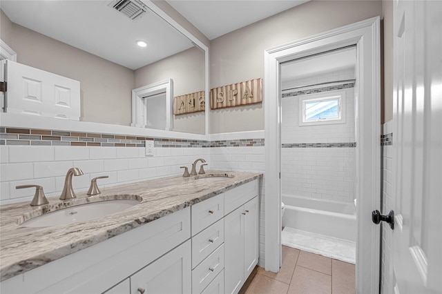 bathroom with double vanity, tile patterned floors, recessed lighting, and bathing tub / shower combination