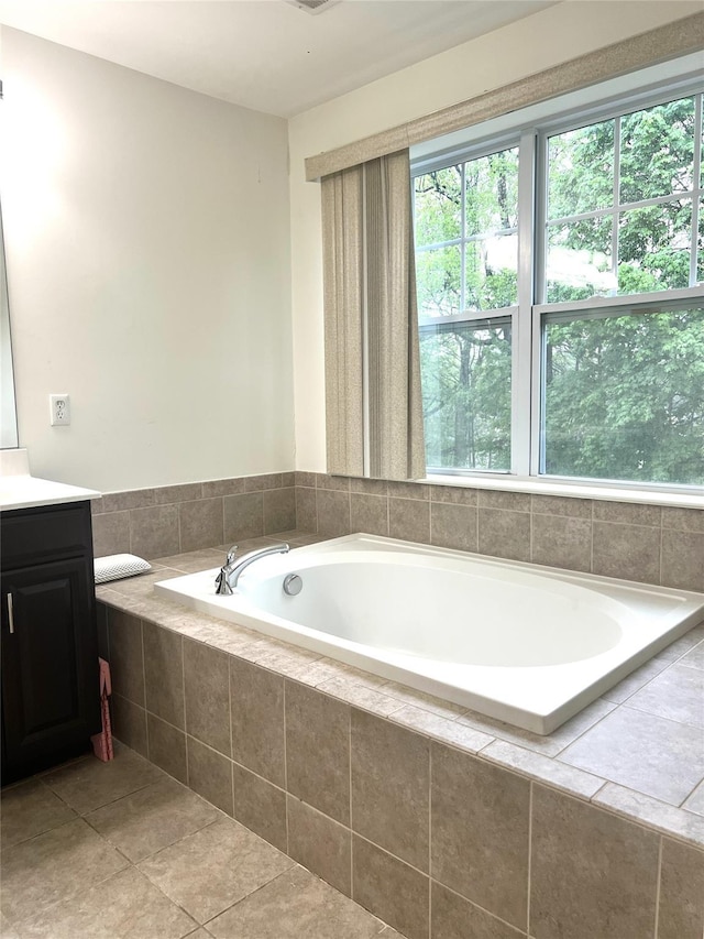 full bath featuring a bath and vanity