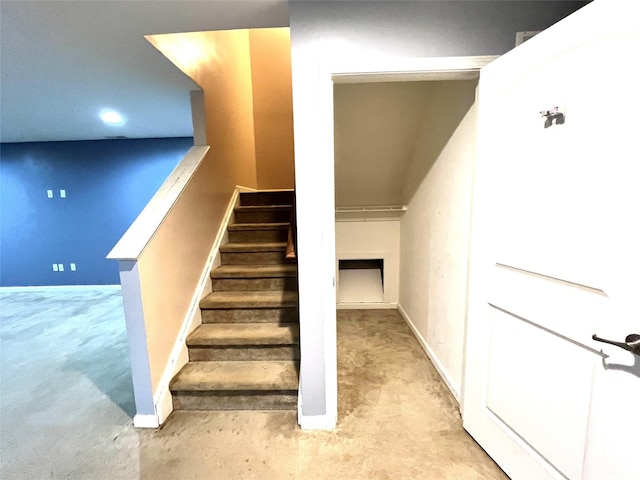 stairway with recessed lighting, baseboards, and carpet floors
