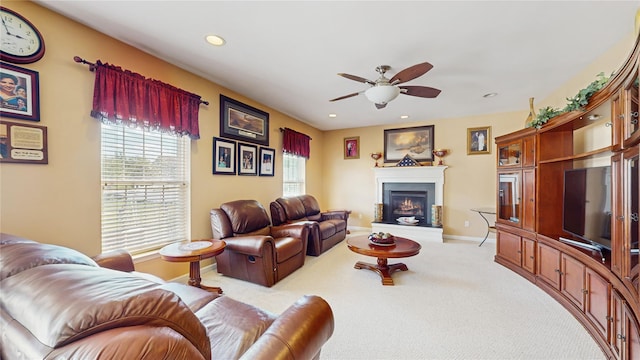 2041 Independence Dr, New Windsor, NY 12553 - carpeted living room featuring a ceiling fan, baseboards, a lit fireplace, and recessed lighting