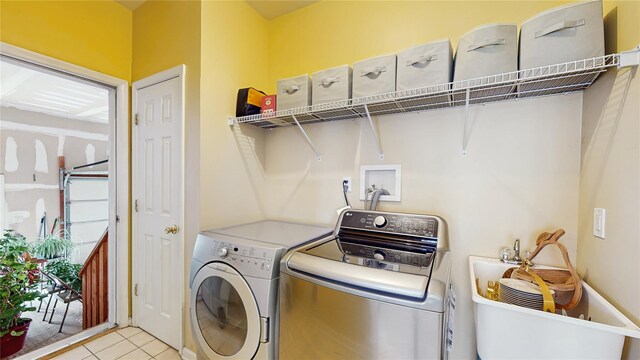 2041 Independence Dr, New Windsor, NY 12553 - washroom with washing machine and clothes dryer and tile patterned floors