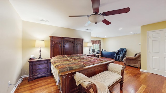 2041 Independence Dr, New Windsor, NY 12553 - bedroom with light wood-style flooring, a ceiling fan, and baseboards