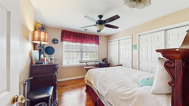2041 Independence Dr, New Windsor, NY 12553 - bedroom featuring multiple closets, wood finished floors, baseboards, and ceiling fan
