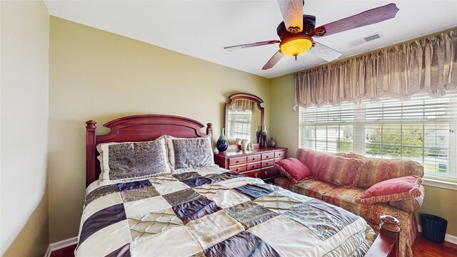 2041 Independence Dr, New Windsor, NY 12553 - bedroom with baseboards, wood finished floors, and ceiling fan