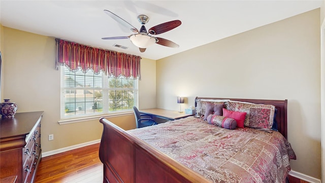 2041 Independence Dr, New Windsor, NY 12553 - bedroom featuring wood finished floors, baseboards, a ceiling fan, and a desk