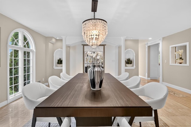65 Round Hill Rd, Armonk, NY 10504 - dining room featuring a chandelier, recessed lighting, and ornate columns