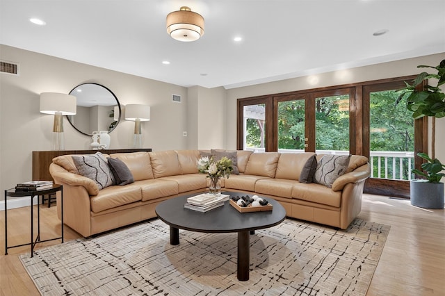 65 Round Hill Rd, Armonk, NY 10504 - living area with light wood finished floors and recessed lighting