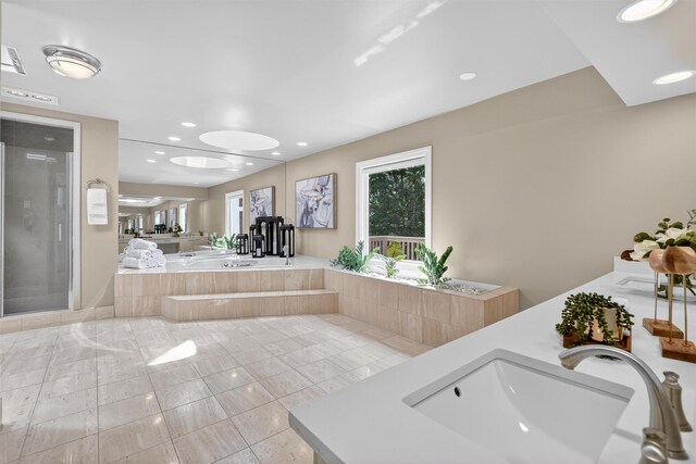 65 Round Hill Rd, Armonk, NY 10504 - bathroom with double vanity, a bath, a shower stall, tile patterned flooring, and recessed lighting