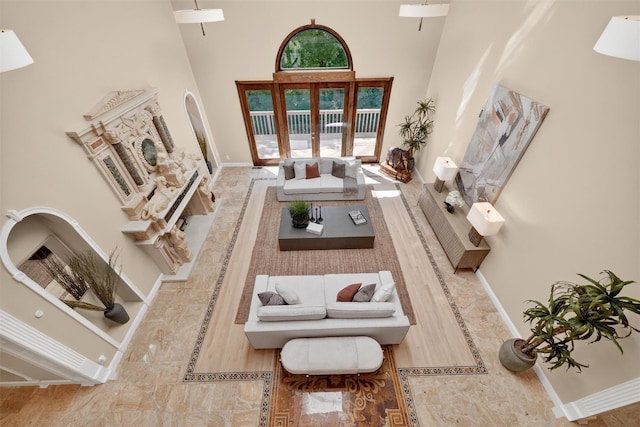 65 Round Hill Rd, Armonk, NY 10504 - living area with french doors and a high ceiling