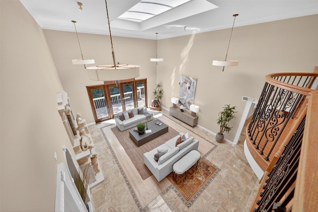 65 Round Hill Rd, Armonk, NY 10504 - living area with a towering ceiling, crown molding, and a skylight