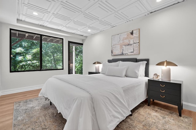 65 Round Hill Rd, Armonk, NY 10504 - bedroom featuring wood finished floors, an ornate ceiling, and recessed lighting