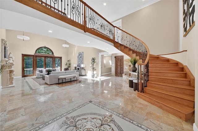 65 Round Hill Rd, Armonk, NY 10504 - entryway featuring a high ceiling, marble tiled flooring, recessed lighting, and stairway
