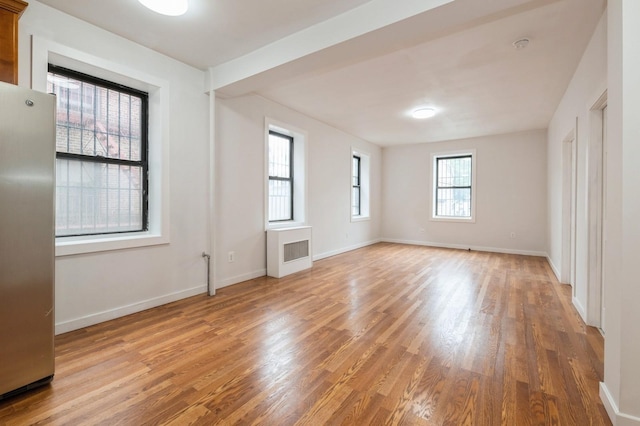 62-64 Saunders Unit K2, Rego Park, NY 11374 - unfurnished room with light wood-type flooring and baseboards