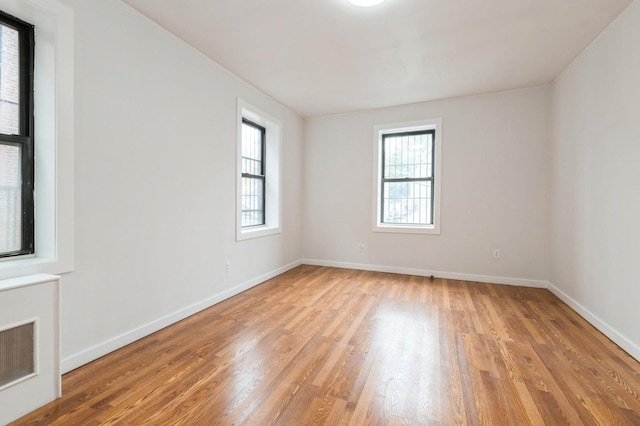 62-64 Saunders Unit K2, Rego Park, NY 11374 - unfurnished room featuring light wood-type flooring and baseboards