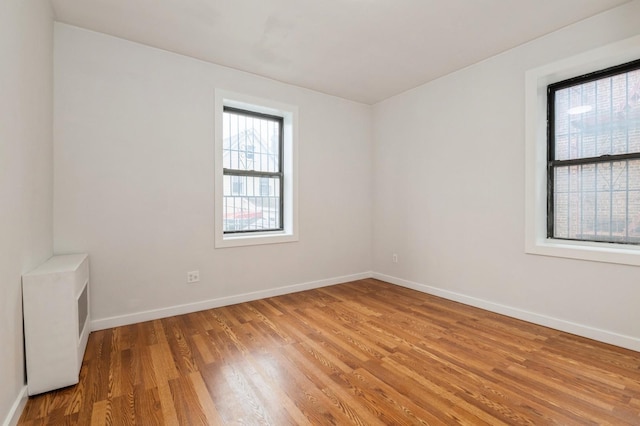 62-64 Saunders Unit K2, Rego Park, NY 11374 - spare room with light wood-style floors and baseboards