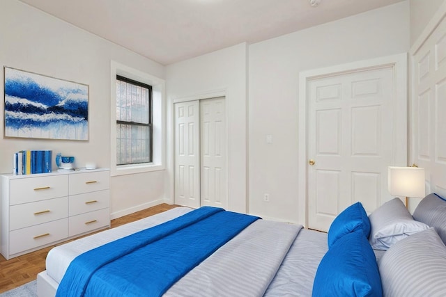 62-64 Saunders Unit K2, Rego Park, NY 11374 - bedroom featuring a closet and baseboards